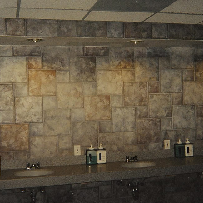 Residential bathroom with tile walls