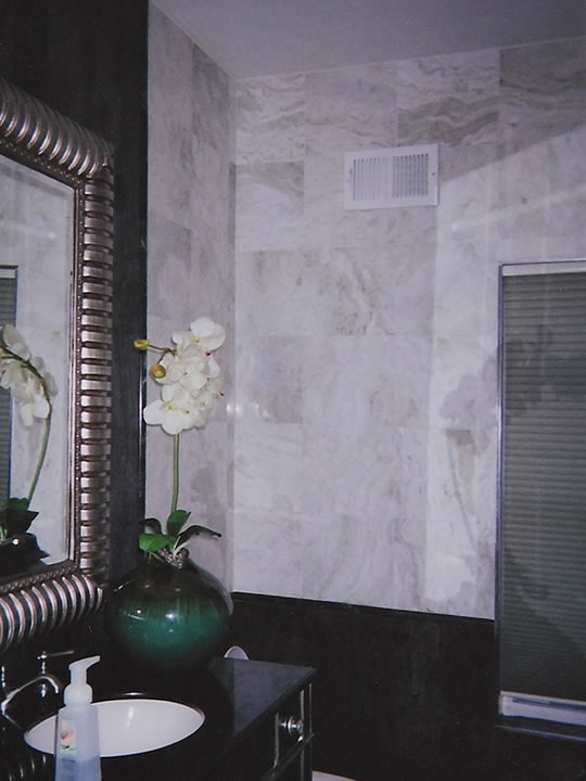 White marble walls in residential bathroom